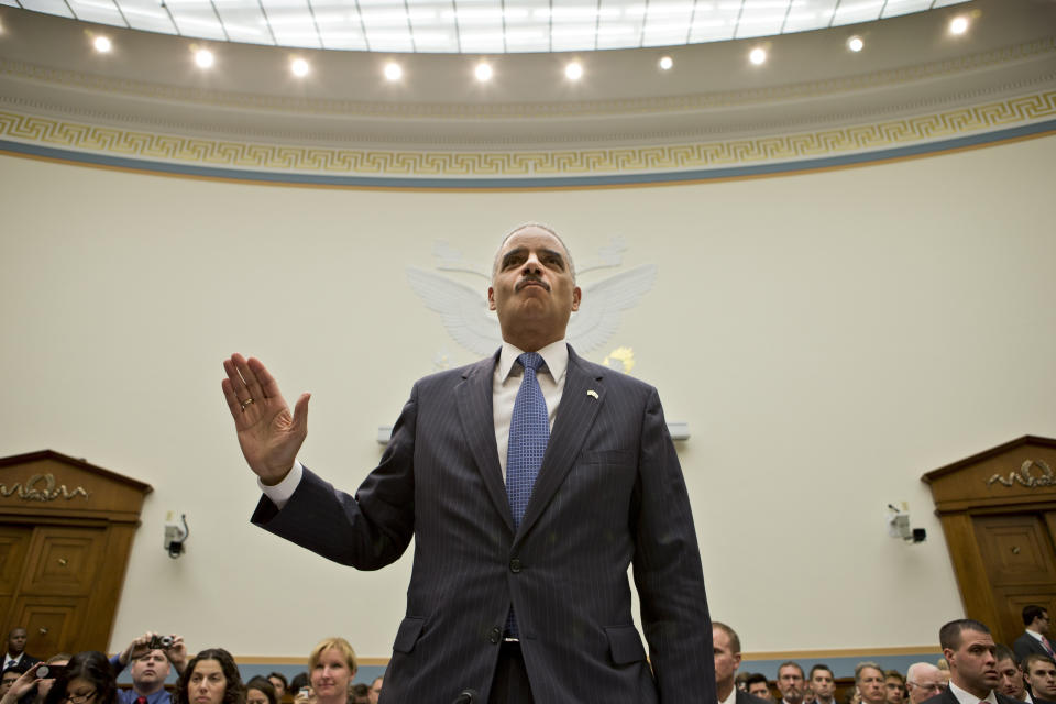 Attorney General Eric Holder, the nation's top law enforcement official, is sworn in on Capitol Hill in Washington, Wednesday, May 15, 2013, prior to testifying before the House Judiciary Committee oversight hearing on the Justice. Department. House Judiciary Committee Chairman Rep. Bob Goodlatte,R-Va., wants to know more about the unwarranted targeting of Tea Party and other conservative groups by the Internal Revenue Service and the Justice Department's secret seizure of telephone records at The Associated Press. (AP Photo/J. Scott Applewhite)