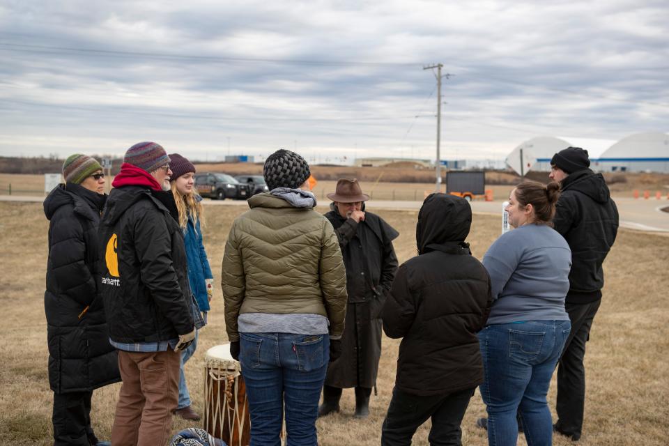 Protesters gather during as construction resumes on the bell bowl prairie on Thursday, March 9, 2023, in Rockford.