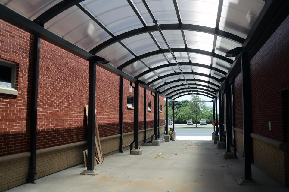 A new awning leads to one of the entrances at Jackson Middle School as part of an improvement project to the school June 17.