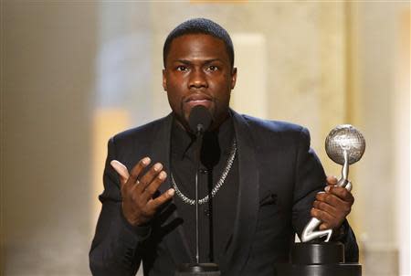 Actor Kevin Hart accepts the Entertainer of the Year Award during the 45th NAACP Image Awards in Pasadena, California February 22, 2014. REUTERS/Danny Moloshok