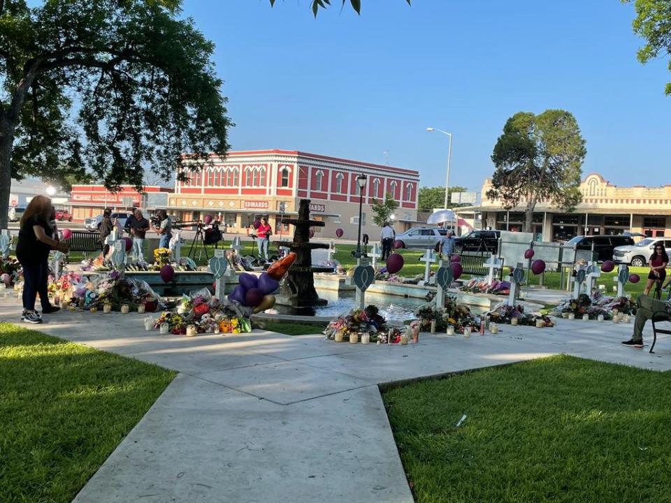 The K-9 Comfort Dog Ministry Teams for Lutheran Church Charities met with grieving community members in the town square of Uvalde, Texas. The crosses, symbolizing and honoring the lives of the victims, were part of the "Hearts of Mercy and Compassion" ministry outreach by the teams.