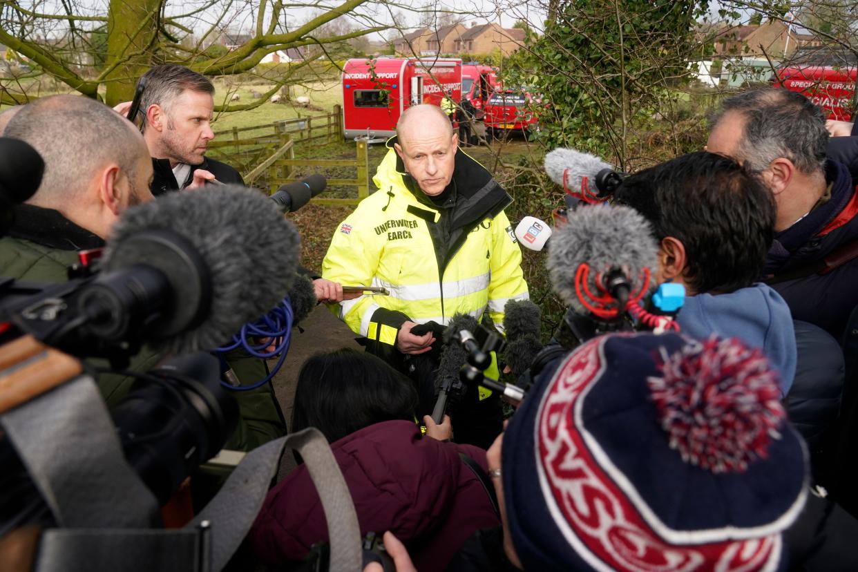 Peter Faulding (centre) CEO of private underwater search and recovery company Specialist Group International (SGI), speaks to the media in St Michael's on Wyre, Lancashire, as police continue their search for missing woman Nicola Bulley, 45, who was last seen on the morning of Friday January 27, when she was spotted walking her dog on a footpath by the nearby River Wyre. Picture date: Monday February 6, 2023.