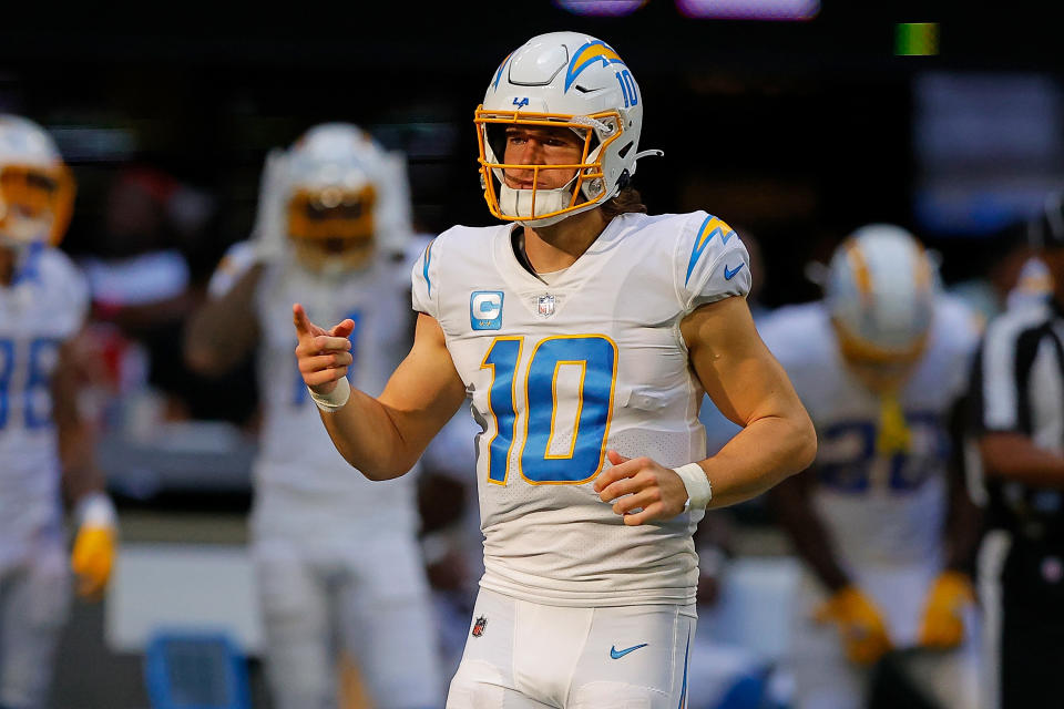 Justin Herbert leads the Chargers against the 49ers on Sunday Night Football. (Photo by Todd Kirkland/Getty Images)