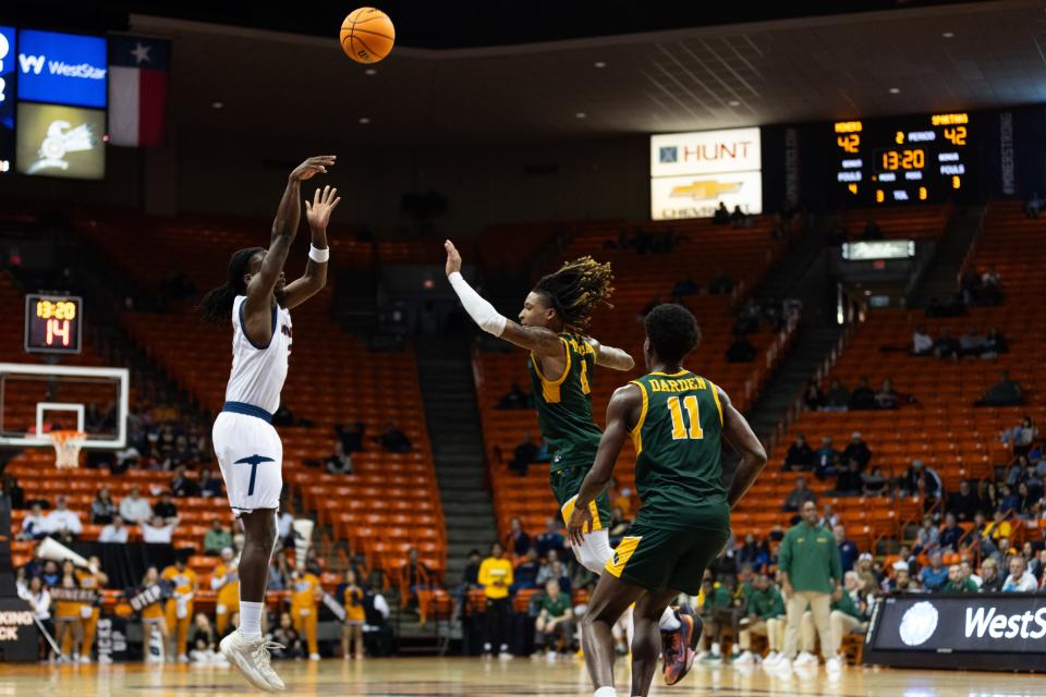 UTEP's Tae Hardy (2) shoots the ball at a men's basketball game against Norfolk State in the Sun Bowl Invitational on Wednesday, Dec. 20, 2023, at the Don Haskins Center in El Paso, Texas. The Miners advanced to the championship game against Wyoming.