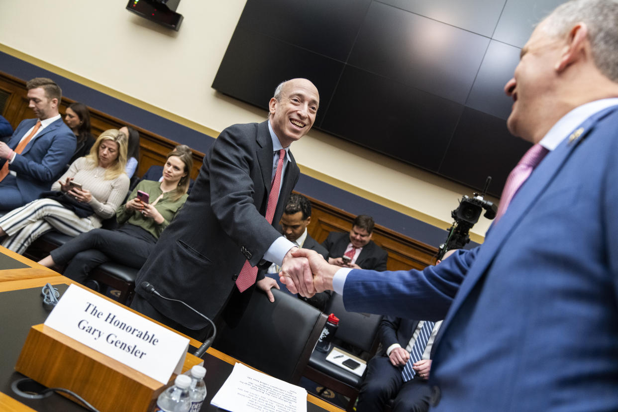 UNITED STATES - APRIL 18: SEC Chair Gary Gensler greets Rep. Sean Casten, D-Ill., during the House Financial Services Committee hearing titled 