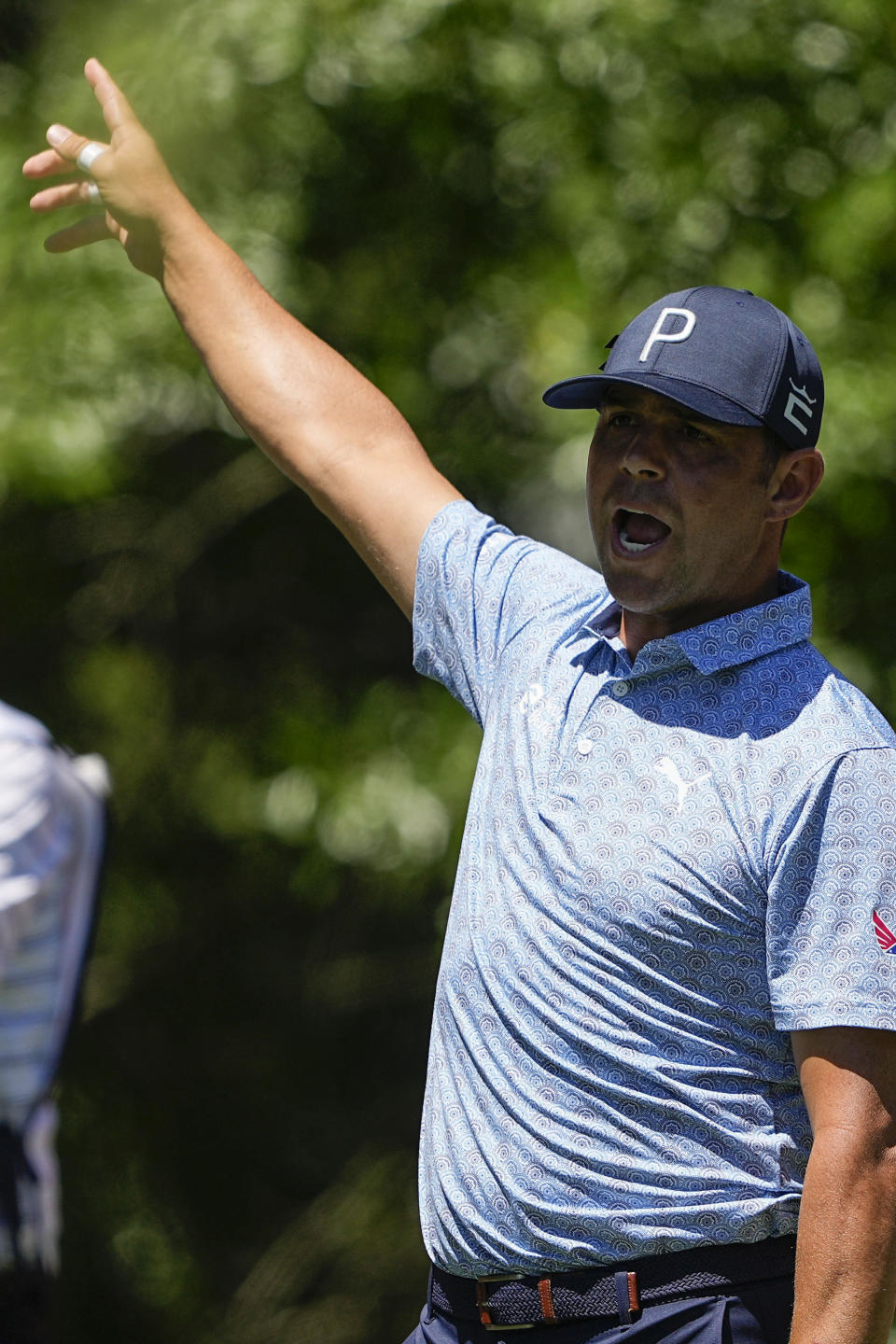 Gary Woodland reacts to his tee shot on the 16th hole during first round of the Wells Fargo Championship golf tournament at the Quail Hollow Club on Thursday, May 4, 2023, in Charlotte, N.C. (AP Photo/Chris Carlson)
