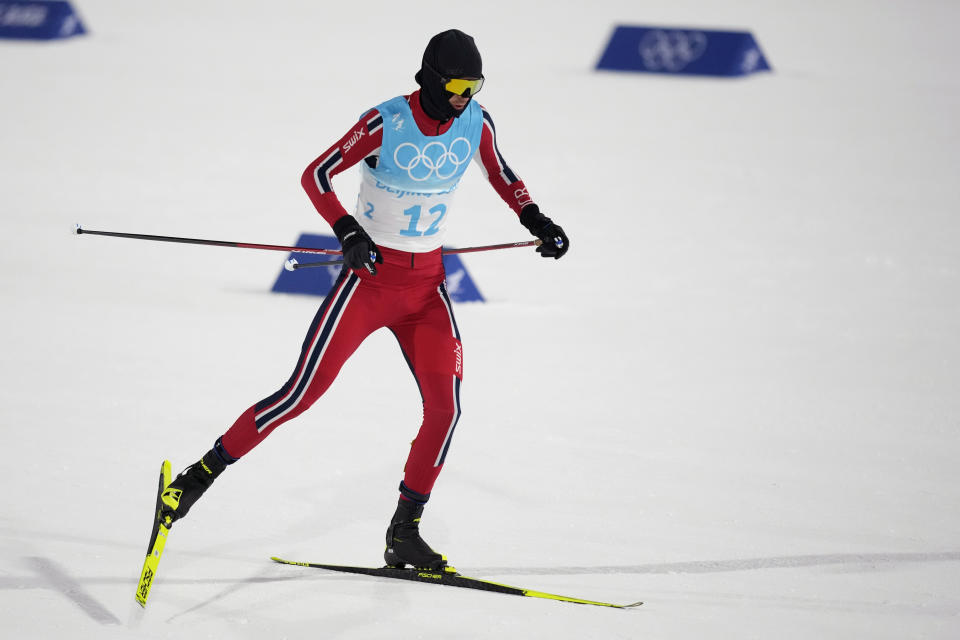 Norway's Joergen Graabak competes during the cross-country skiing portion of the individual Gundersen large hill/10km competition at the 2022 Winter Olympics, Tuesday, Feb. 15, 2022, in Zhangjiakou, China. (AP Photo/Aaron Favila)