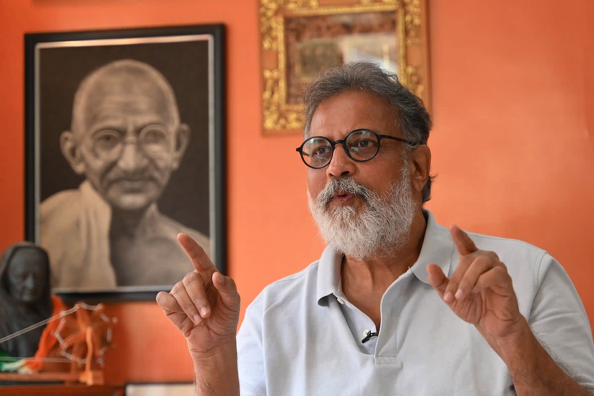 Indian author Tushar Gandhi, who is the great-grandson of Mahatma Gandhi, speaks during an interview at his home in Mumbai (AFP via Getty Images)