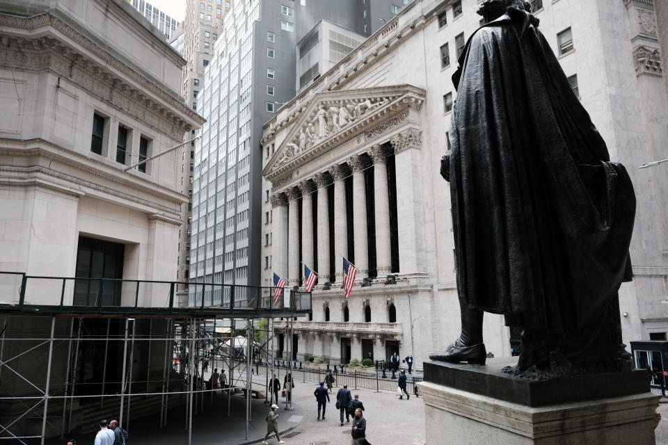 NEW YORK, NEW YORK - MAY 11: People walk by the New York Stock Exchange after global stocks fell as concerns mount that rising inflation will prompt central banks to tighten monetary policy on May 11, 2021 in New York City. By mid afternoon the tech-heavy Nasdaq Composite had lost 0.6% after falling 2.2% at its session low.  (Photo by Spencer Platt/Getty Images)