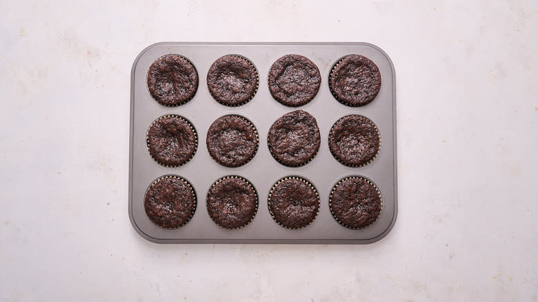 caked cupcakes in muffin tin