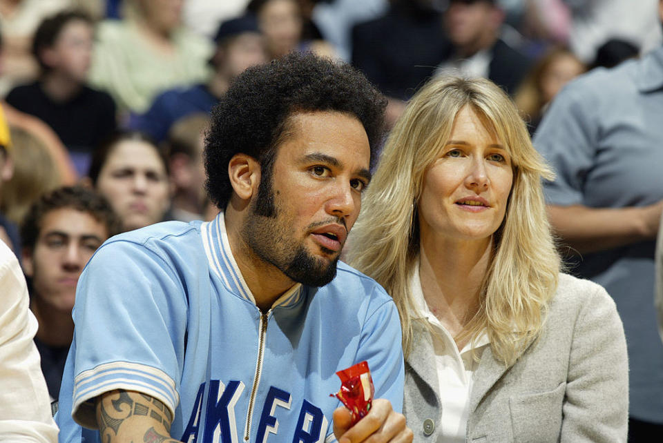 Ben and Laura in the audience of a sporting event