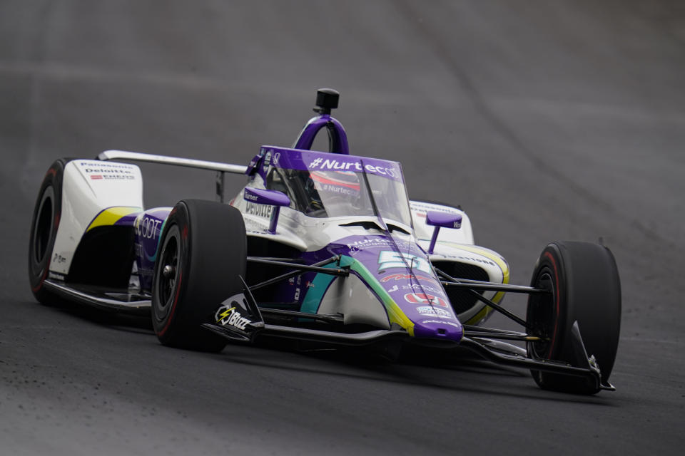 Takuma Sato, of Japan, drives into the first turn during practice for the IndyCar auto race at Indianapolis Motor Speedway in Indianapolis, Thursday, May 19, 2022. (AP Photo/Michael Conroy)