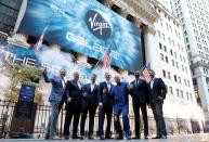 Sir Richard Branson stands outside the New York Stock Exchange (NYSE) ahead of Virgin Galactic's IPO in New York