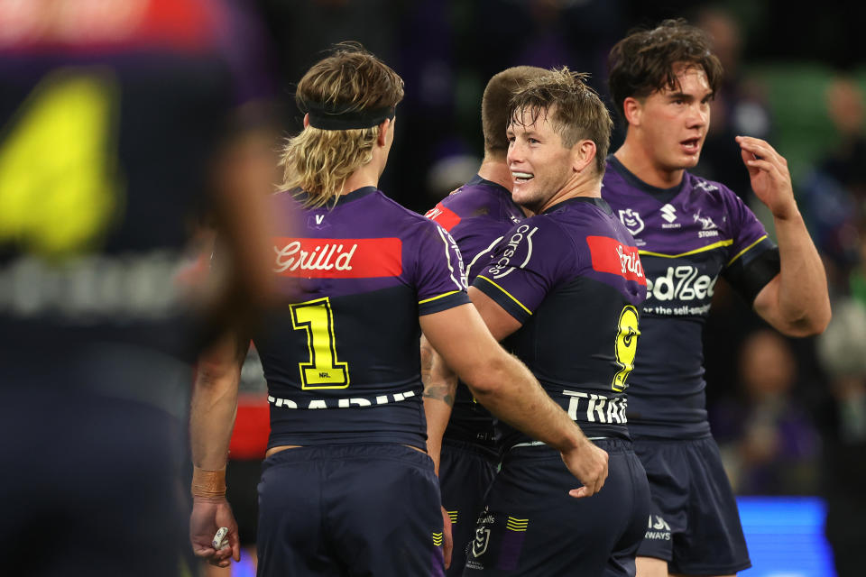 Harry Grant and Ryan Papenhuyzen celebrate.