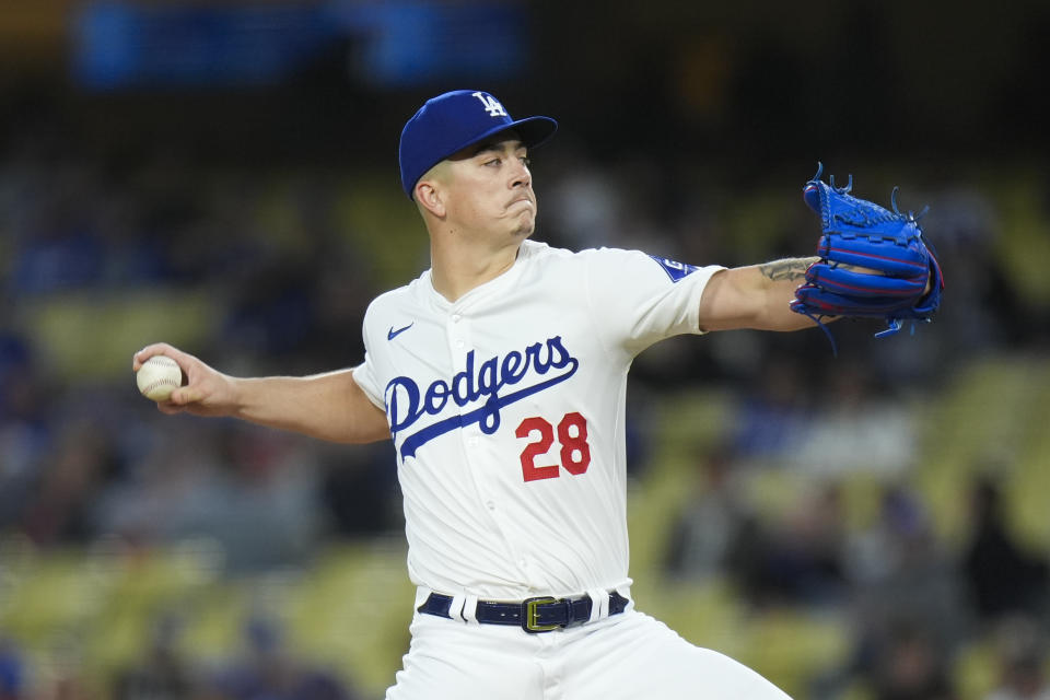 Los Angeles Dodgers starting pitcher Bobby Miller throws against the St. Louis Cardinals during the first inning of a baseball game Friday, March 29, 2024, in Los Angeles. (AP Photo/Jae C. Hong)