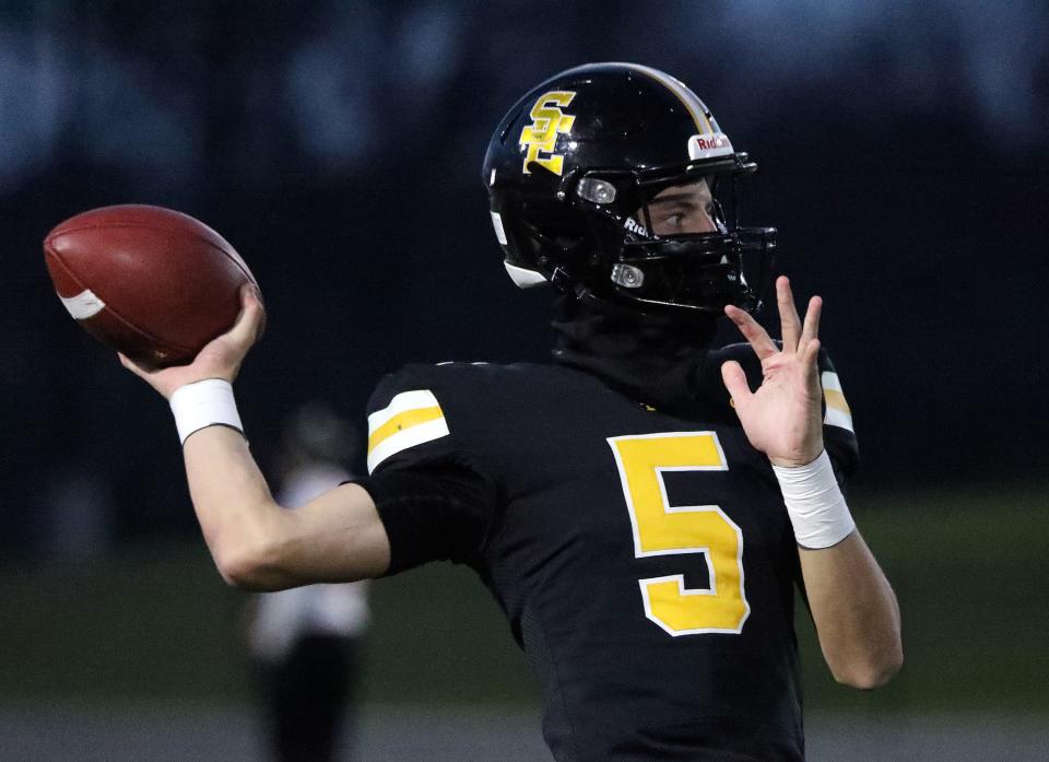 Southeast Polk quarterback and Iowa State recruit Connor Moberly warms up before a Class 5A state quarterfinal game against Cedar Falls.