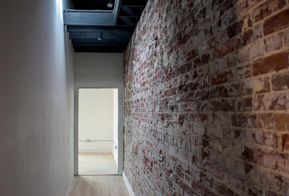 The loft apartments above Marmaduke’s Lodge feature original exposed brickwork and views of downtown Leesburg. They are shown on Wednesday, May 1, 2024.