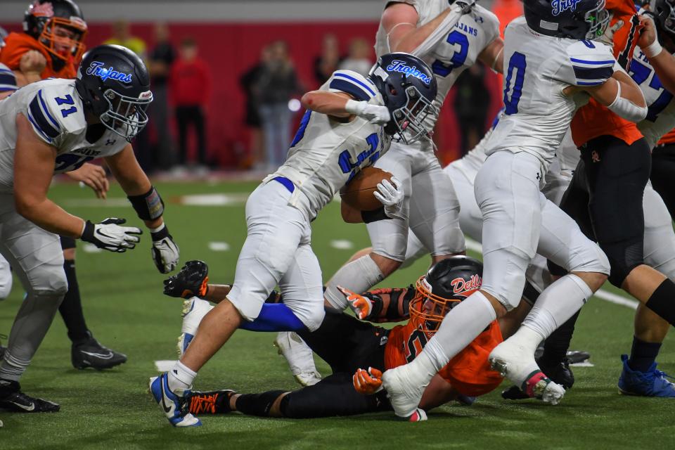 West Central's running back Jesse Jost (33) evades during a play against Dell Rapids on Friday, Nov. 10, 2023 at DakotaDome in Vermillion, South Dakota.