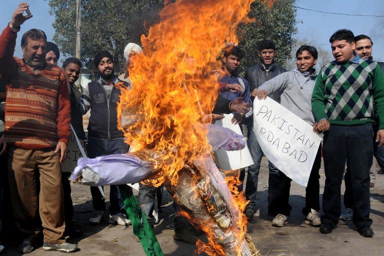 Activists burn an effigy during a protest in Amritsar on January 10, 2013 over the deaths of two Indian soldiers, apparently at the hands of Pakistani troops. Pakistan accused Indian troops of opening fire and killing a Pakistani soldier on Thursday, the third deadly cross-border incident reported in five days in the disputed Kashmir region