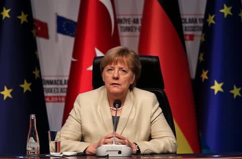 Angela Merkel has come under pressure over her immigration policies - Credit: Lefteris Pitarakis