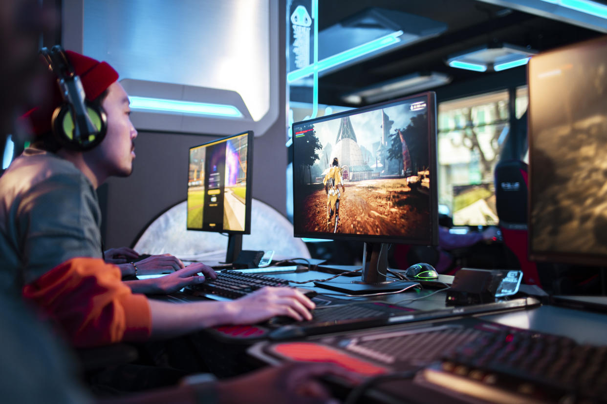 Close-up of a male eSports player competing in a tournament. (Photo: Getty)