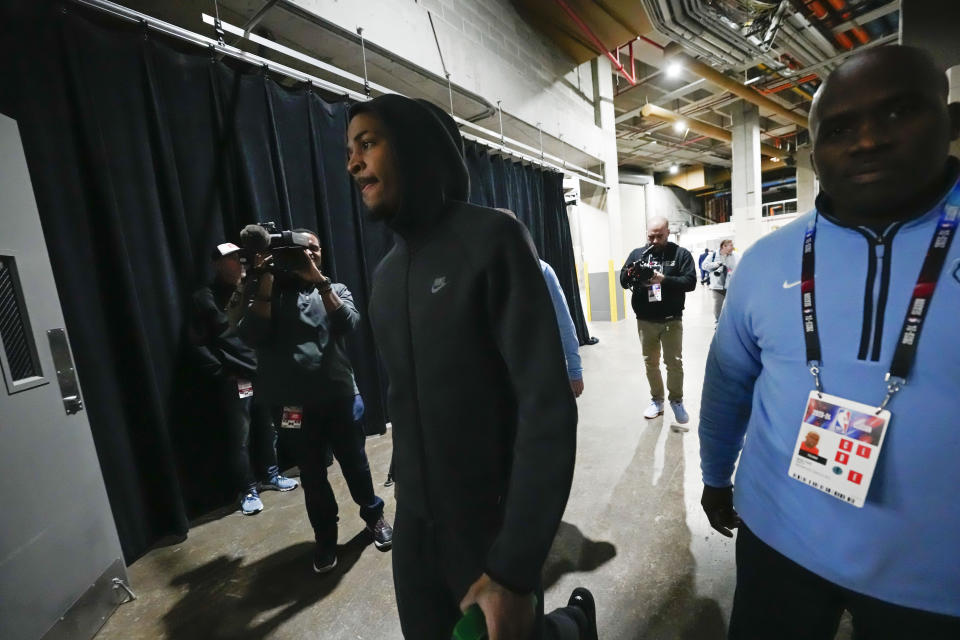 Memphis Grizzlies guard Ja Morant arrives at the Smoothie King Center for an NBA basketball game against the New Orleans Pelicans in New Orleans, Tuesday, Dec. 19, 2023. (AP Photo/Gerald Herbert)