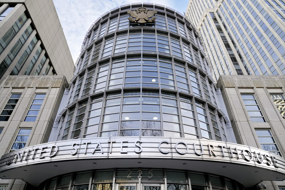 The seal of the United States is displayed on the facade of Federal court in Brooklyn, Tuesday, Jan. 17, 2023, in New York. Luna goes on trial on charges of helping the Sinaloa Cartel traffic drugs and protect them from capture while he was serving as Mexico’s top security official. (AP Photo/John Minchillo)