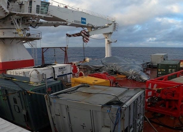 The recovery of the wreckage of a sunken F-35 stealth fighter jet from the South China Sea.