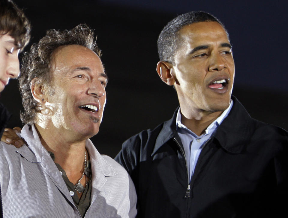 FILE - This Nov. 2, 2008 file photo shows musician Bruce Springsteen, left, with then Democratic presidential candidate Sen. Barack Obama, D-Ill., at a rally at the Cleveland Mall in Cleveland, Ohio. Springsteen posted a message on his website Wednesday, Oct. 17, 2012, endorsing Obama's re-election. Springsteen is making his debut Thursday on the 2012 campaign trail with Bill Clinton at events in Cleveland and Ames, Iowa. (AP Photo/Alex Brandon, file)