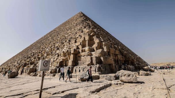 PHOTO: Tourists visit the Great Pyramid of Khufu (Cheops) at the Giza Pyramids necropolis on the southwestern outskirts of Cairo, on February 2, 2023. (Khaled Desouki/AFP via Getty Images)