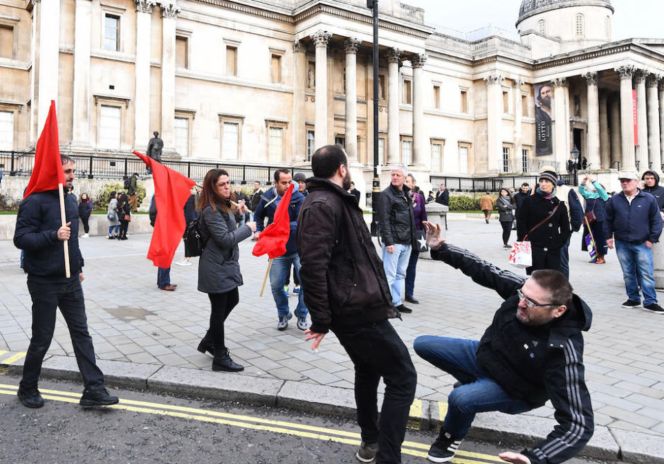 Rival protesters clash in Trafalgar Square as people take part in an anti-fascist counter-demonstration against a “Brexit Betrayal” march and rally organised by Ukip (Picture: PA)