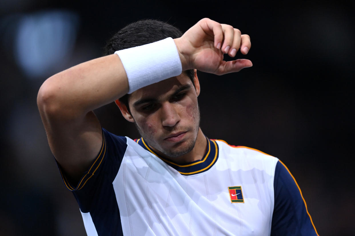 PARIS, FRANCE - NOVEMBER 04: Carlos Alcaraz of Spain reacts during his singles match against  Hugo Gaston of France on Day Four of the Rolex Paris Masters at AccorHotels Arena on November 04, 2021 in Paris, France. (Photo by Justin Setterfield/Getty Images)