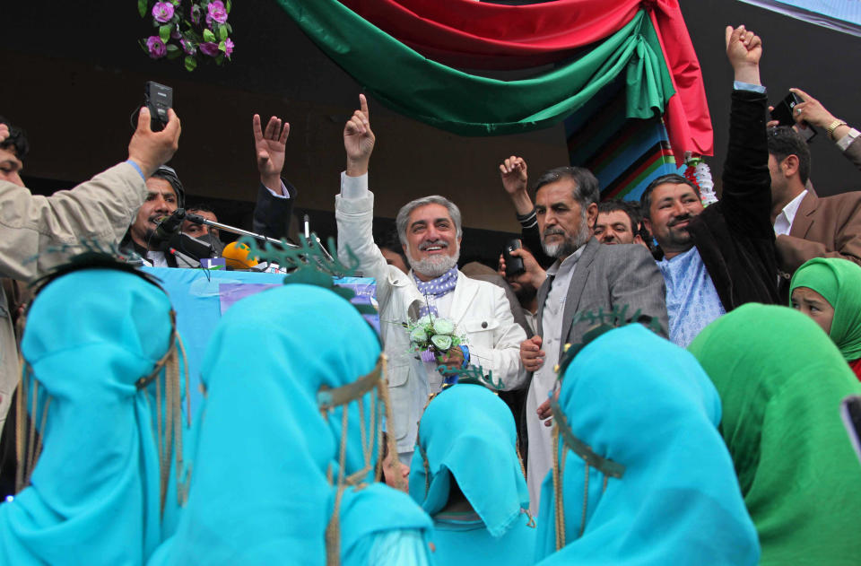 Afghan presidential candidate Abdullah Abdullah arrives for a campaign rally in Herat, Afghanistan, Tuesday, April 1, 2014. Eight Afghan presidential candidates are campaigning for the third presidential election. Elections will take place on April 5, 2014. (AP Photo/Hoshang Hashimi)