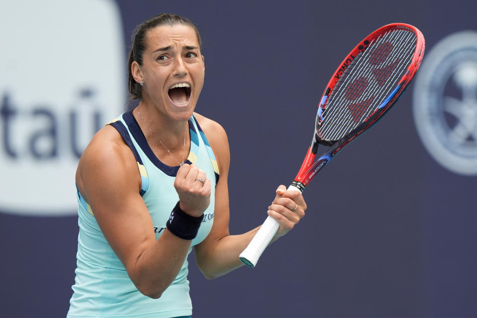 Caroline Garcia, of France, celebrates after beating Coco Gauff during the Miami Open tennis tournament, Monday, March 25, 2024, in Miami Gardens, Fla. (AP Photo/Wilfredo Lee)