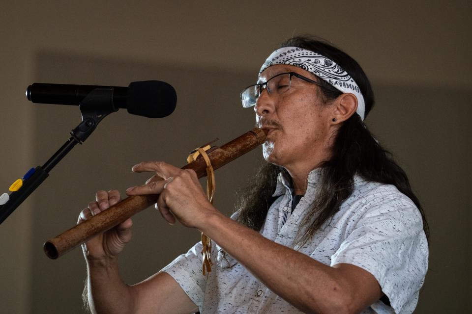 Ed Kabotie plays his flute during the "Native Voices of the Grand Canyon" program on Aug. 5, 2023, at Shrine of the Ages on the South Rim of the Grand Canyon.