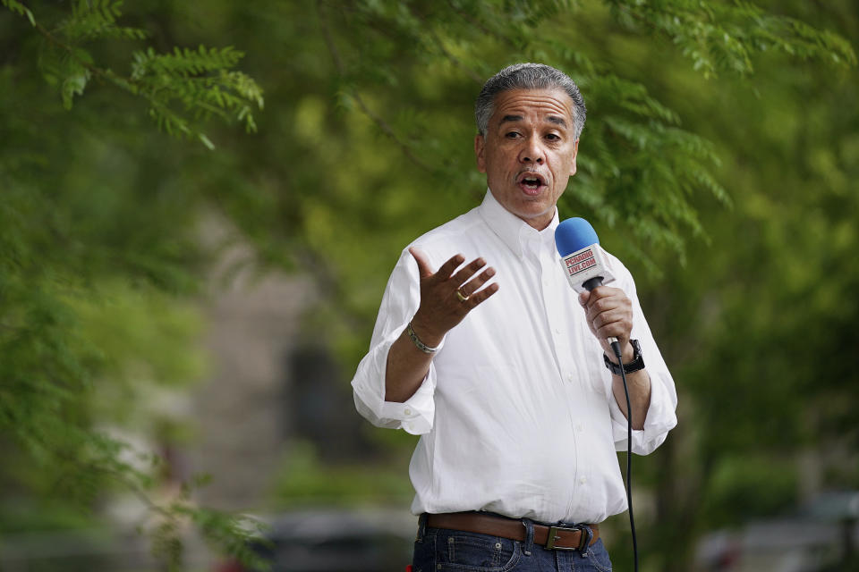 Philadelphia District Attorney candidate Carlos Vega speaks during an anti-violence rally at Clara Muhammad Square in West Philadelphia on Saturday, May 15, 2021. Vega is running against incumbent Larry Krasner in the Democratic primary May 18. (Tim Tai/The Philadelphia Inquirer via AP)