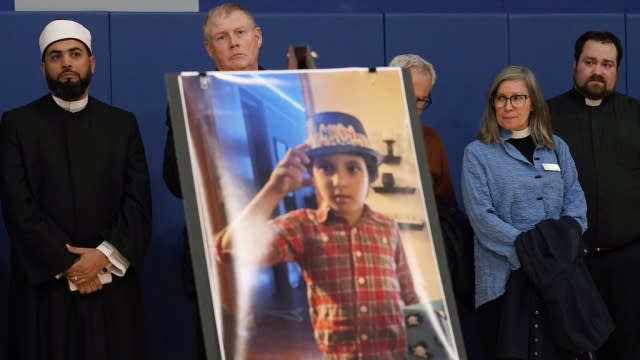 Mourners attend a vigil for Wadea Al Fayoume at Prairie Activity and Recreation center in Plainfield, Illinois.