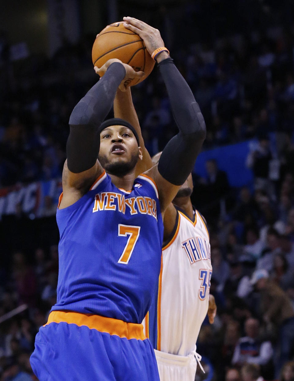 New York Knicks forward Carmelo Anthony (7) has his shot blocked by Oklahoma City Thunder forward Kevin Durant (35) in the first quarter of an NBA basketball game in Oklahoma City, Sunday, Feb. 9, 2014. (AP Photo/Sue Ogrocki)