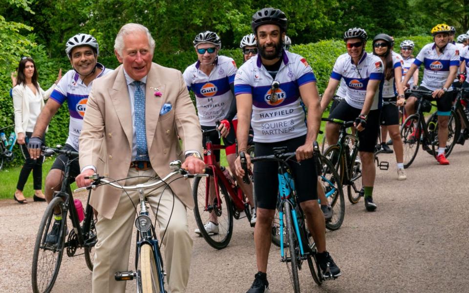 Prince Charles joins members of the British Asian Trust for a short ride - ARTHUR EDWARDS/POOL/AFP via Getty Images