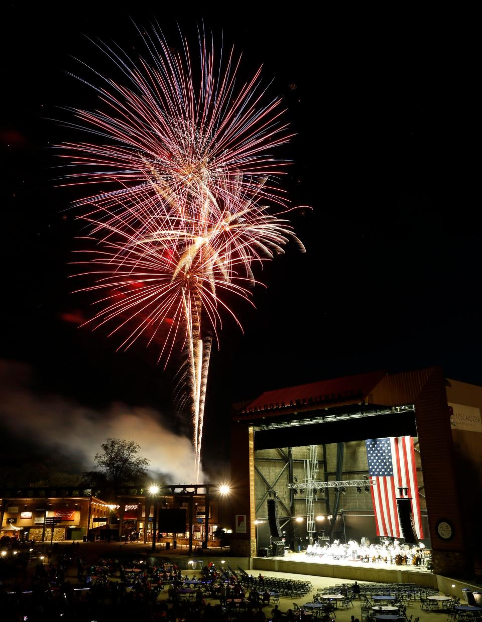 Fourth of July celebrants enjoy the fireworks show from inside the Tuscaloosa Amphitheater Thursday, July 4, 2019. [Staff Photo/Gary Cosby Jr.]