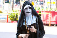 <p>A cosplayer dressed as a creepy nun at Comic-Con International on July 18, 2018, in San Diego. (Photo: Daniel Knighton/Getty Images) </p>