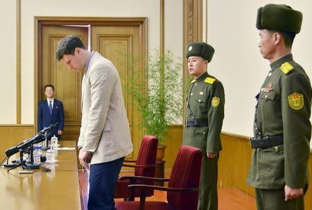 Otto Frederick Warmbier (3rd R), a University of Virginia student who has been detained in North Korea since early January, attends a news conference in Pyongyang, North Korea, in this photo released by Kyodo February 29, 2016. REUTERS/Kyodo