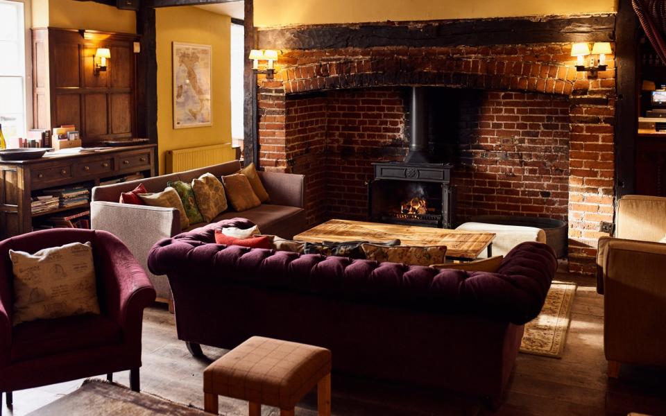 The Sun Inn seating by fire