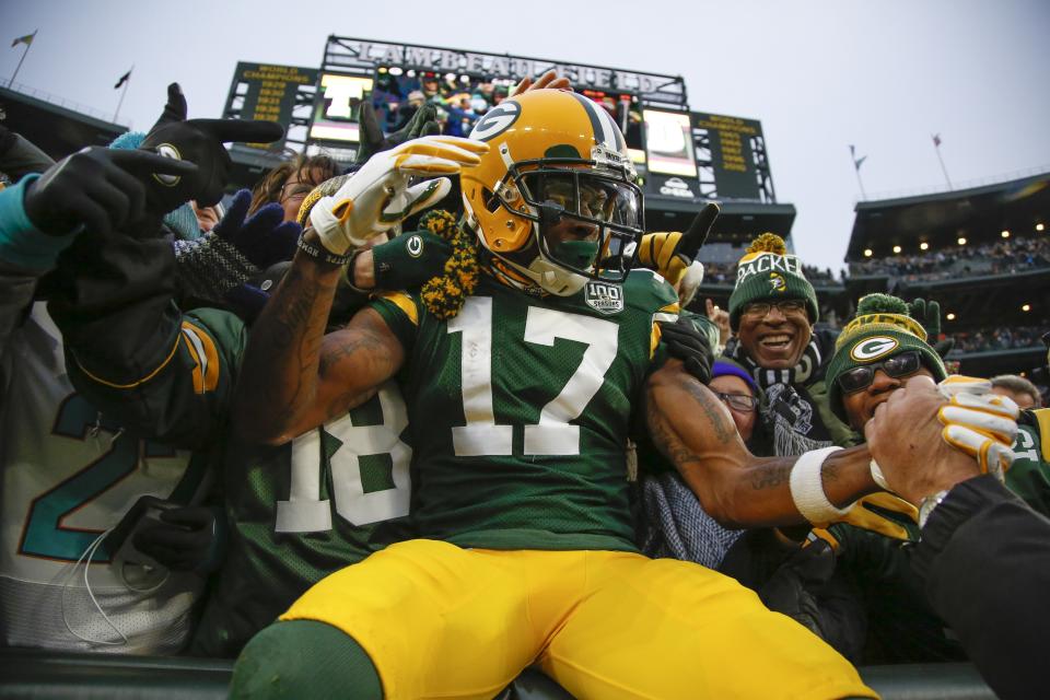 Green Bay Packers' Davante Adams (17) celebrates his touchdown catch during the first half of an NFL football game against the Miami Dolphins, Sunday, Nov. 11, 2018, in Green Bay, Wis. (AP Photo/Matt Ludtke)