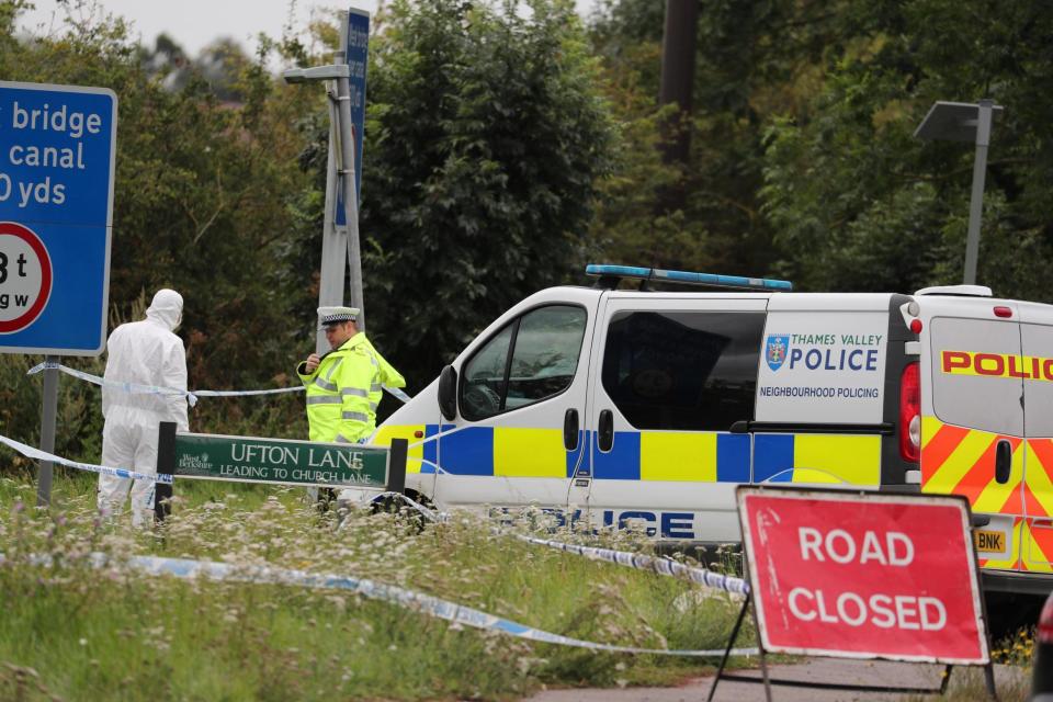 Police cordon off the area where Pc Harper died (PA)