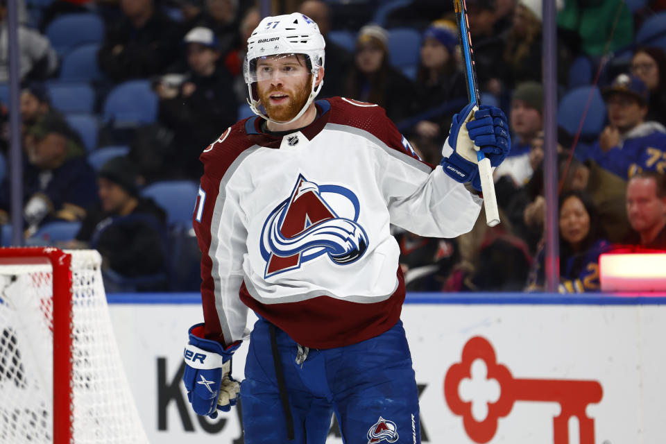 Colorado Avalanche left wing J.T. Compher (37) celebrates his second goal against the Buffalo Sabres, during the second period of an NHL hockey game Thursday, Dec. 1, 2022, in Buffalo, N.Y. (AP Photo/Jeffrey T. Barnes)