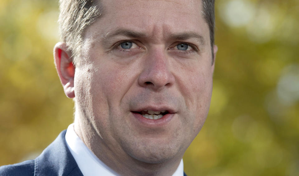 FILE - In this Oct. 15, 2019, file photo, Conservative Leader Andrew Scheer responds to a question during a campaign stop in Quebec City, Canada. Polls show that Scheer has a chance to defeat Justin Trudeau's Liberal party in national elections on Monday, Oct. 21. (Adrian Wyld/The Canadian Press via AP, File)