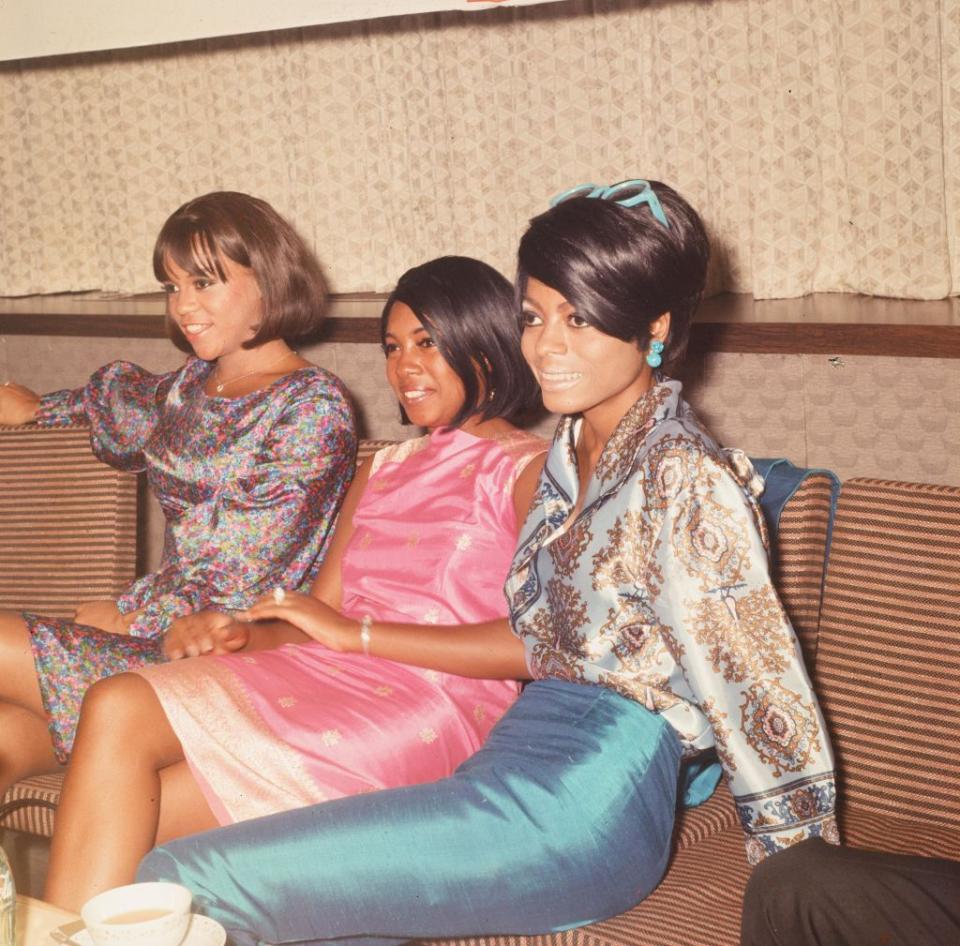 <p>In 1966, the group traveled to Japan as part of an international tour. Ross wears a bright blue crepe pencil skirt and silk blouse for the press event at their hotel in Tokyo.</p>