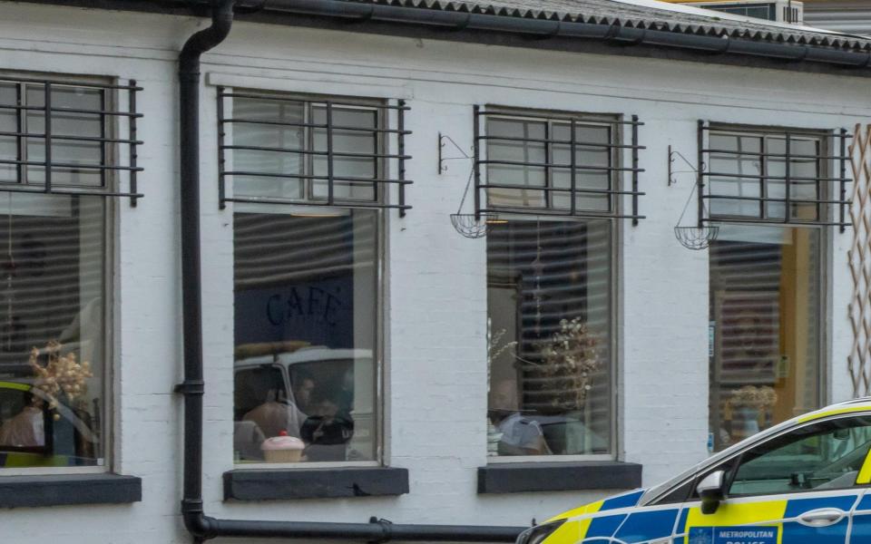 Police suspected to be dining inside The Chef House Kitchen Cafe, Greenwich - Brian Jennings/SWNS
