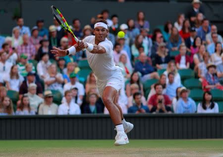 Tennis - Wimbledon - All England Lawn Tennis and Croquet Club, London, Britain - July 11, 2018 Spain's Rafael Nadal in action during his quarter final match against Argentina's Juan Martin Del Potro REUTERS/Andrew Couldridge